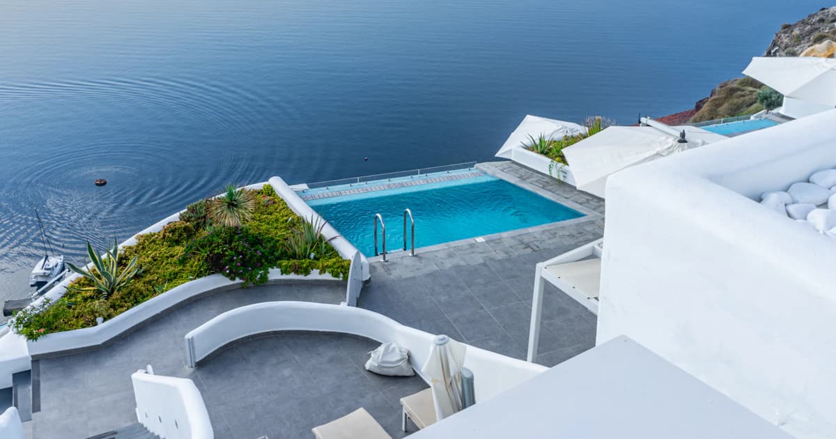Cliffside villa with a private pool above the caldera in Oia, Santorini, Greece